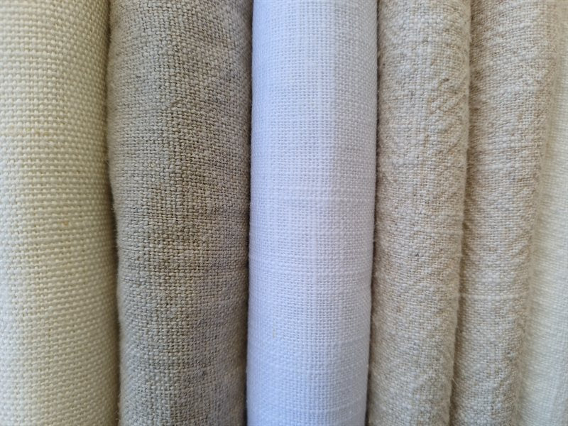 A pile of natural linen fabric
